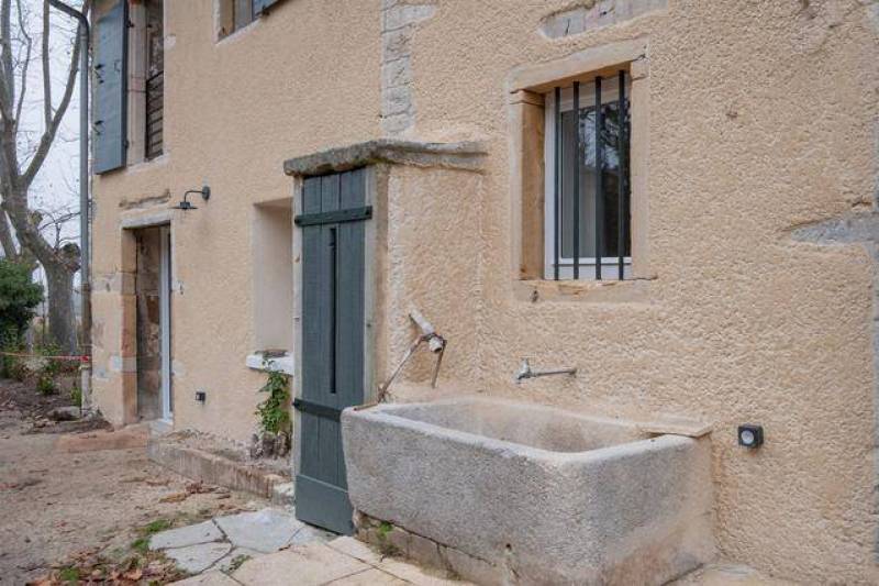Ravalement d'une façade d'ancienne grange rénovée à Irigny proche de Lyon